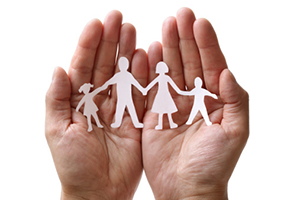 vida Paper chain family protected in cupped hands